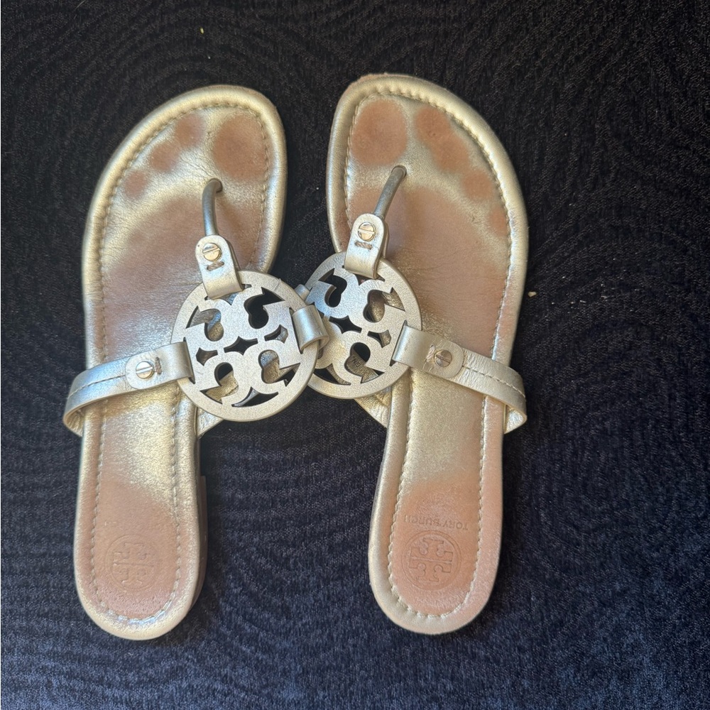 Gold Tory Burch flip flops